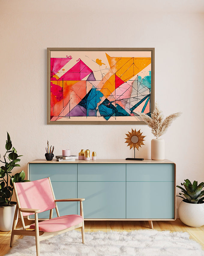 abstract wall art tilted hanging in living room hanging above unit. artwork described as bright colours and lines in geometric shapes overlapping to form a visually pleasing artwork.