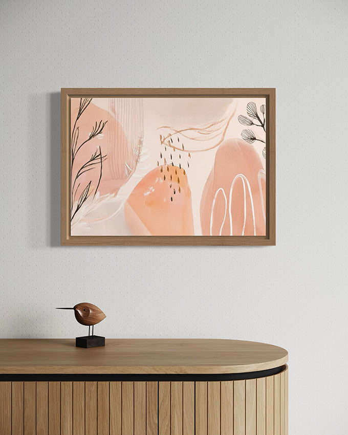 after the rain botanical wall art. soft pastel colours of apricot and blush pink combined with painted leaves and rain drops create a beautiful and unique abstract nature based artwork. artwork is hanging in a high quality canvas timber float frame.