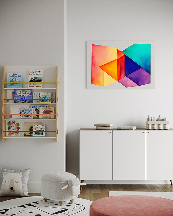 abstract artwork several shapes overlayed in a rainbow of colours creating an angular and unique wall art print, print is hanging above a low lying cupboard in a Childs bedroom
