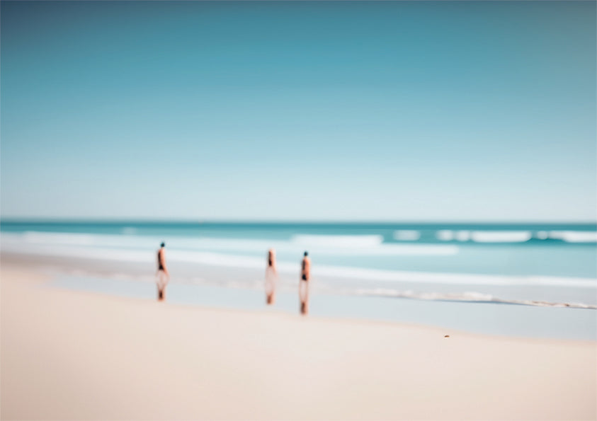 Beach Day a unique wall art print featuring a blurred beach scene. Waves crash whilst people watch from the sand.