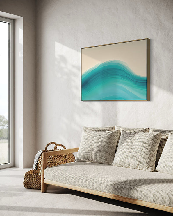 swell unique wall art print, coastal abstract wave in blue and aqua tones. wall art print in living room above a soft beige lounge.