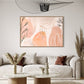 after the rain botanical wall art.  soft pastel colours of apricot and blush pink combined with painted leaves and rain drops create a beautiful and unique abstract nature based artwork.  artwork is hanging above a lounge in a canvas float frame. artwork is extra large.