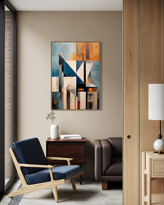 Modern living room with abstract wall art, chair, and sofa.