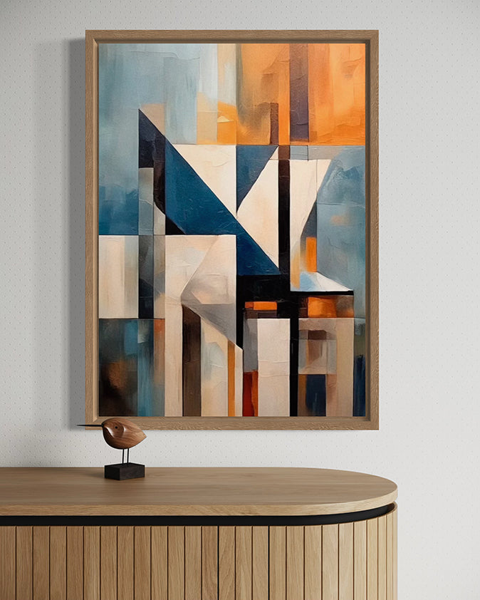 Abstract wall art print with geometric shapes in blue, orange, and grey. Artwork is hanging in a canvas float frame.
