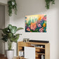 rainbow florals botanical wall art print with pastel rainbow colours, unique wall art print hanging above a hutch with plant pots around it