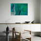wall art print, artwork depicting an aerial view of the earth as it intersects with rivers and estuaries. Artwork has greens and blues in varying tones. Artwork hanging in living room.