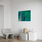 wall art print, artwork depicting an aerial view of the earth as it intersects with rivers and estuaries. Artwork has greens and blues in varying tones. Artwork hanging in living room.