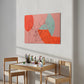 printable wall art, red, pink and a muted blue colours with a line drawing over the top create a unique printable artwork, hanging in a child's room above a drawing table.