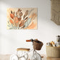 botanical wall art print, orange and brown leaves with apricot coloured background, botanical wall art hanging in child's room above a tricycle