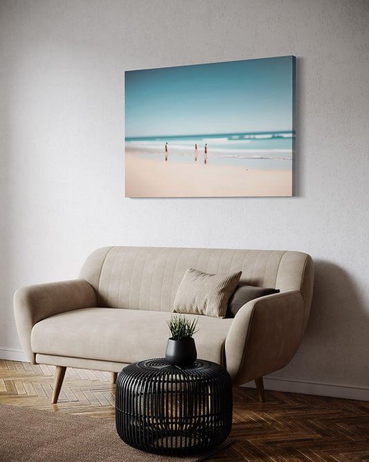 Beach Day a unique wall art print featuring a blurred beach scene.  Waves crash whilst people watch from the sand. Wall art print in living room above lounge. 