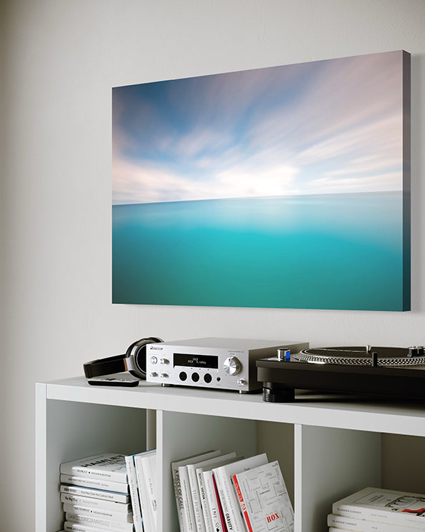 unique wall art print, soothing horizon is a coastal abstract artwork featuring a gorgeous blue horizon. wall art canvas hanging in living room.