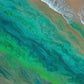 tidal whispers unique wall art print, waves gentle lapping at the shore in green and aqua tones. 
