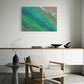 tidal whispers unique wall art print, waves gentle lapping at the shore in green and aqua tones. art print in living room.