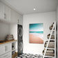 Unique Wall Art print, white wash, encapsulates the clean, fresh energy of the ocean as it meets the shore.  wall art print hanging in laundry room.