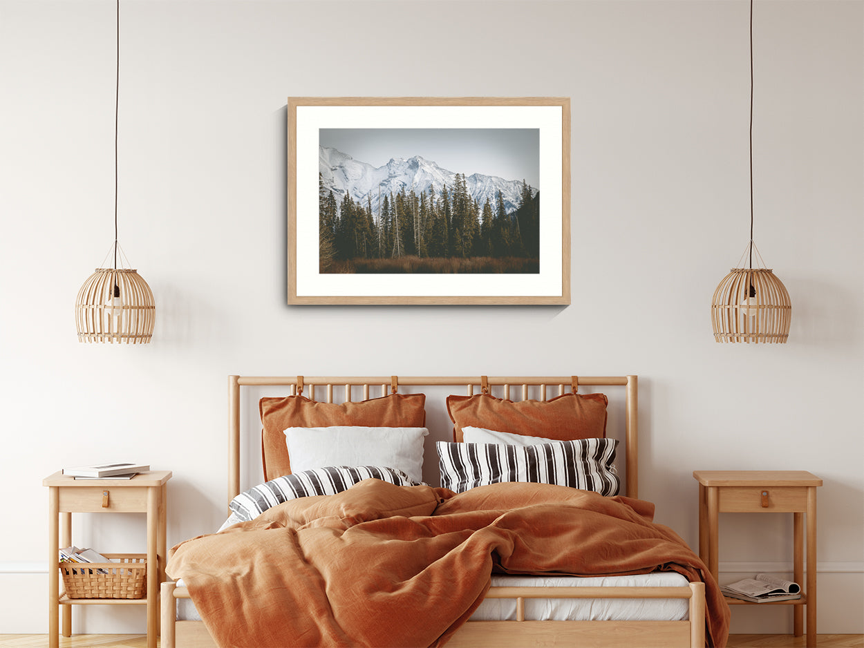 Landscape Photography Wall Art Print, snow capped mountains and pine trees nature photography in a timber frame.  Wall Art in living room